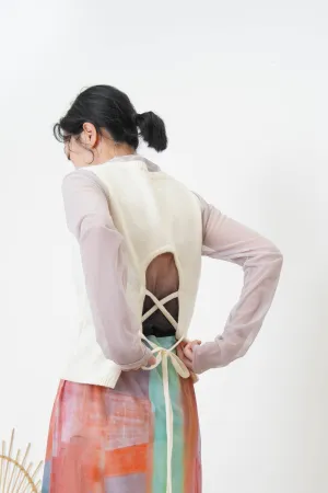 Ivory knit vest w/ strings back details