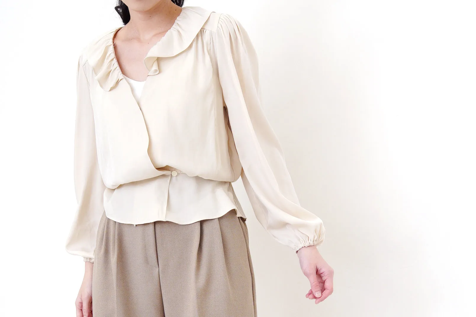 Ivory v neck knit vest in twist pattern