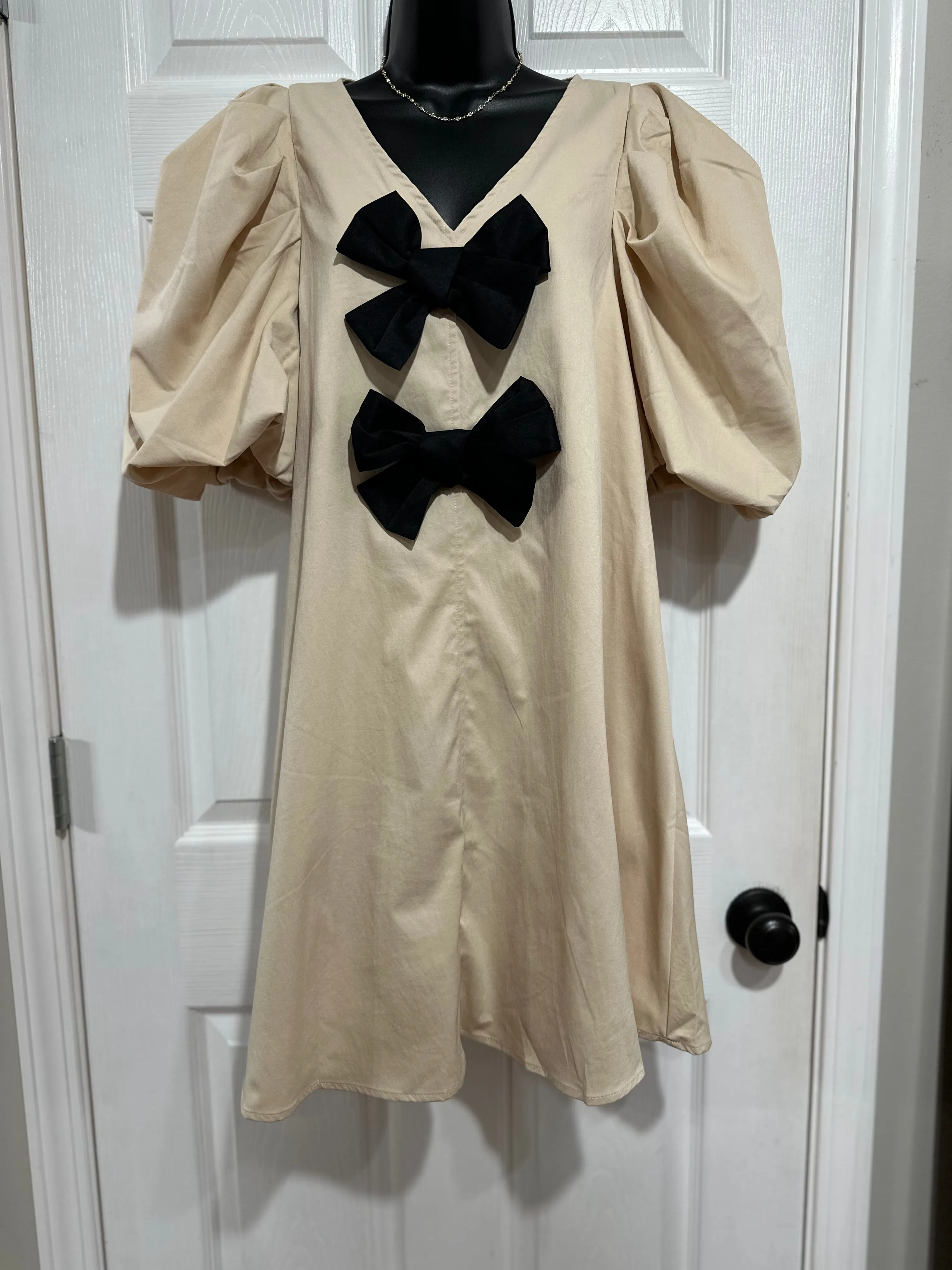 Ivory/Black Dress with Bows Details
