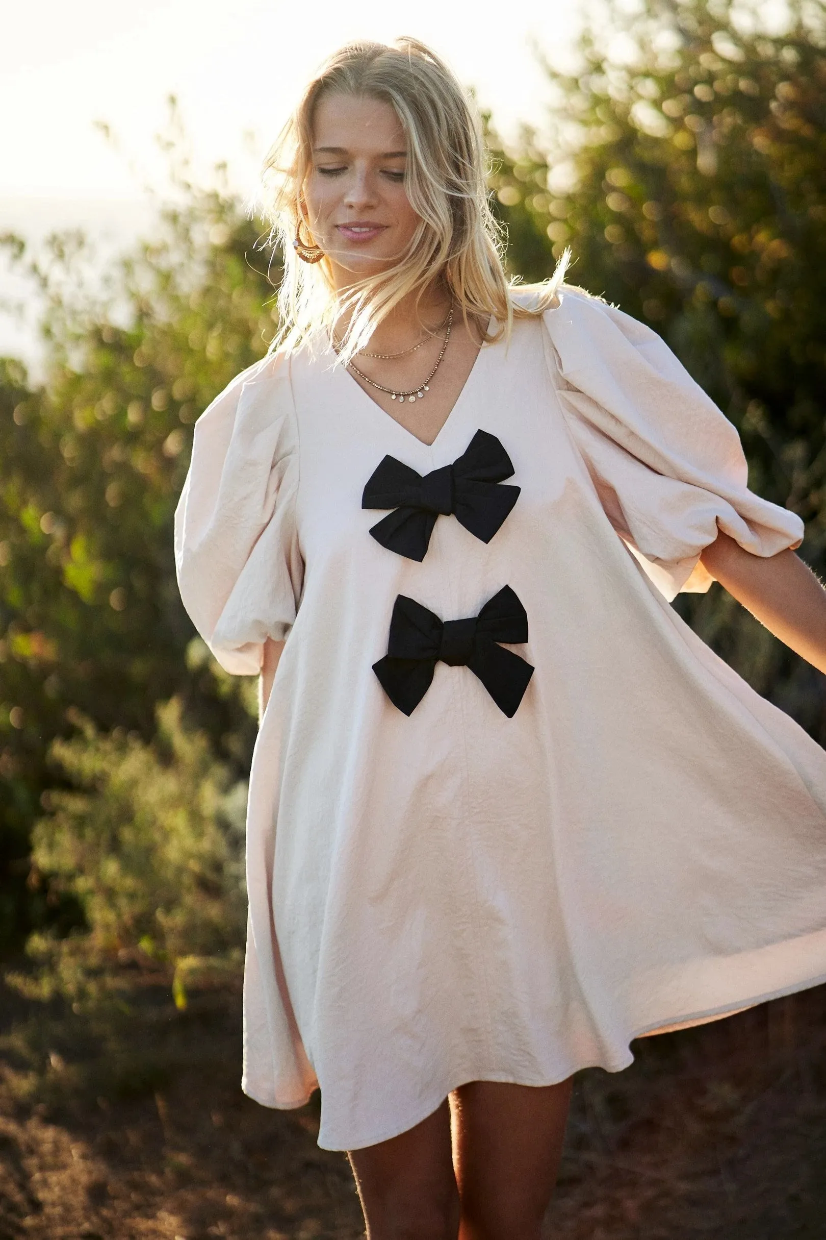 Ivory/Black Dress with Bows Details